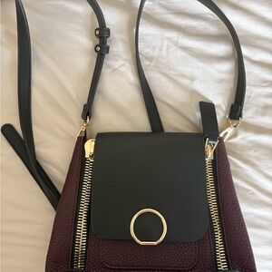 Women's Burgundy and Black Crossbody Backpack - Gold Accent